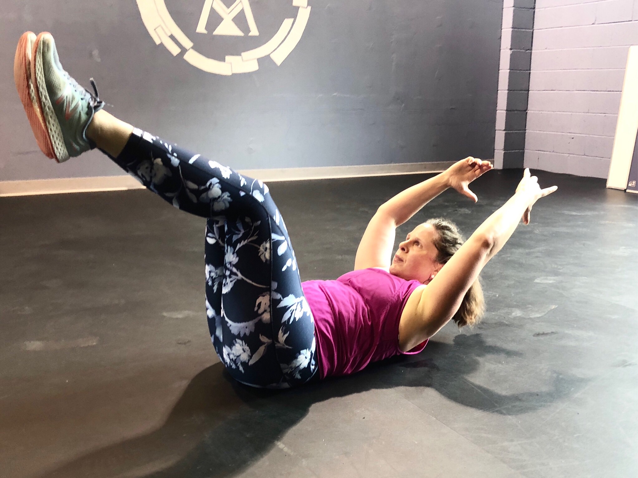 kettlebell workout, workout, crossfit, wellness coach, personal training, group workout, community workout, winston salem, north carolina, boat pose, ab strength, core strength, concentration